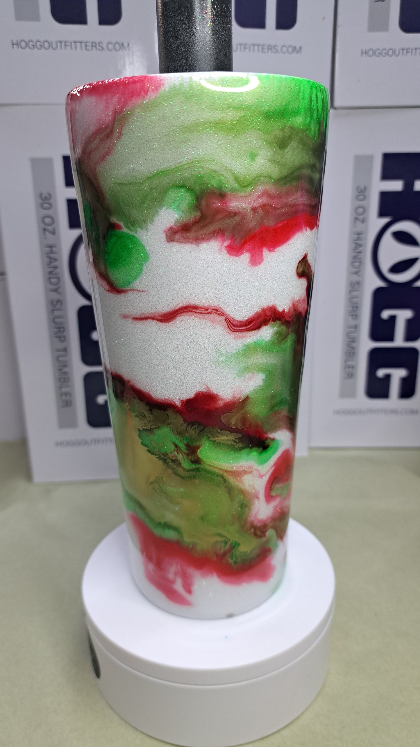 #33. 30oz Handy Slurp stainless steel drinking tumbler with white glitter base.