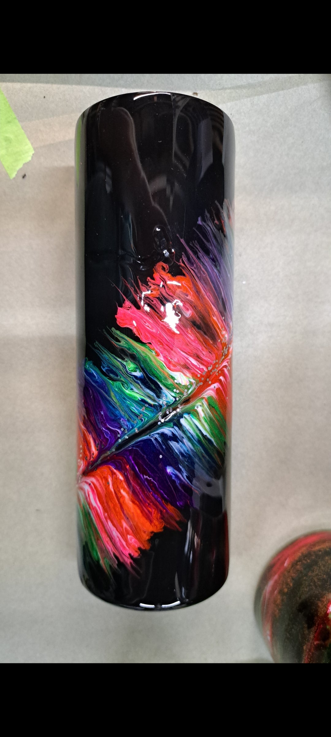 20oz skinny stainless steel drinking tumbler with neon Feather that glows !