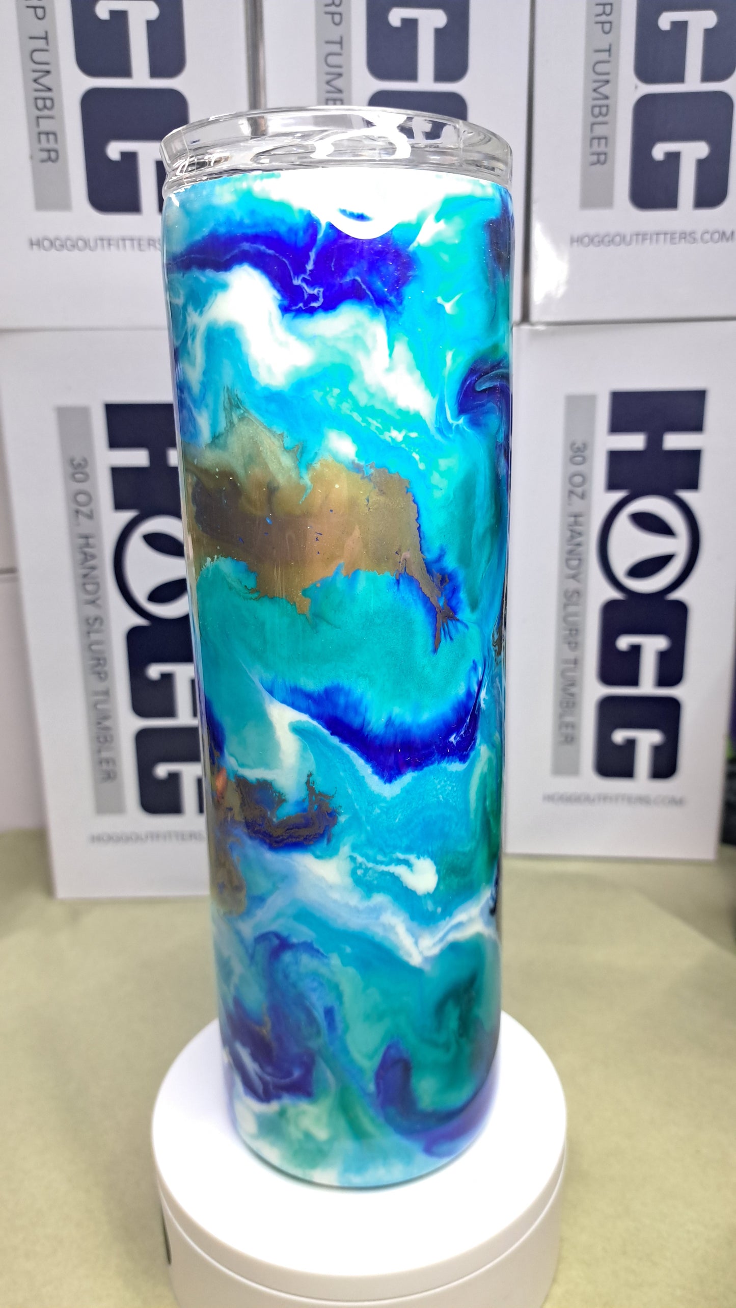 #23 30oz Hogg skinny stainless steel drinking tumbler. this thing glows like crazy !